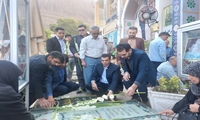 کرمان/ ادای احترام کارکنان اموال تملیکی به مقام شامخ شهیدان